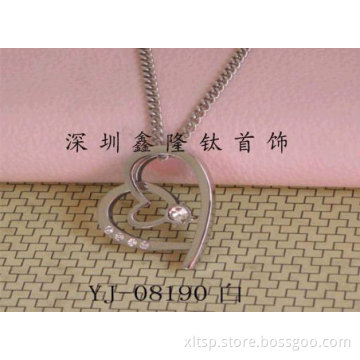 TC46 Stainless Steel Heart Pattern Gold Pendant with CZ Stones